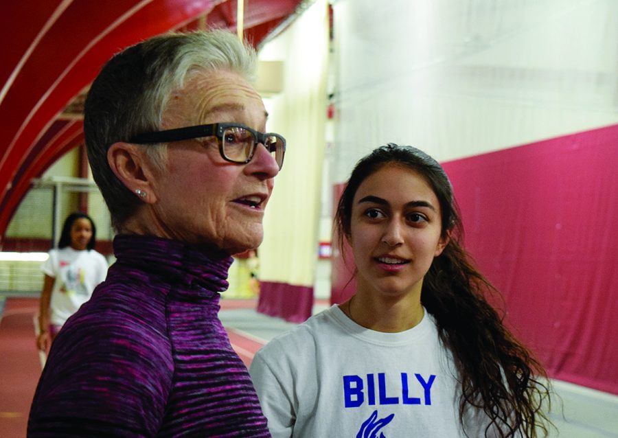 READY TO RUN. Head track coach Lynne Ingalls speaks to girls
track team member and captain Alex Stevanovich after a workout.