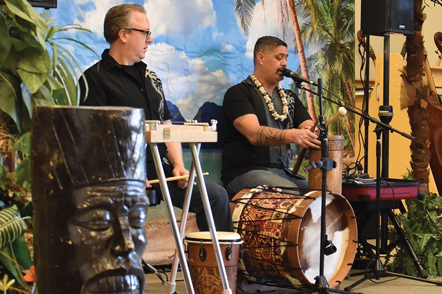 SHAKA TIME. Slide guitar player Billy Williams and Drummer Chris Tiuaana play Polynesian music for a seventh grade class on Feb. 2. A series of geographic locations featured in the “American Epic” documentary were created around Lab to provide the community the opportunity to explore the music through interactive experiences.