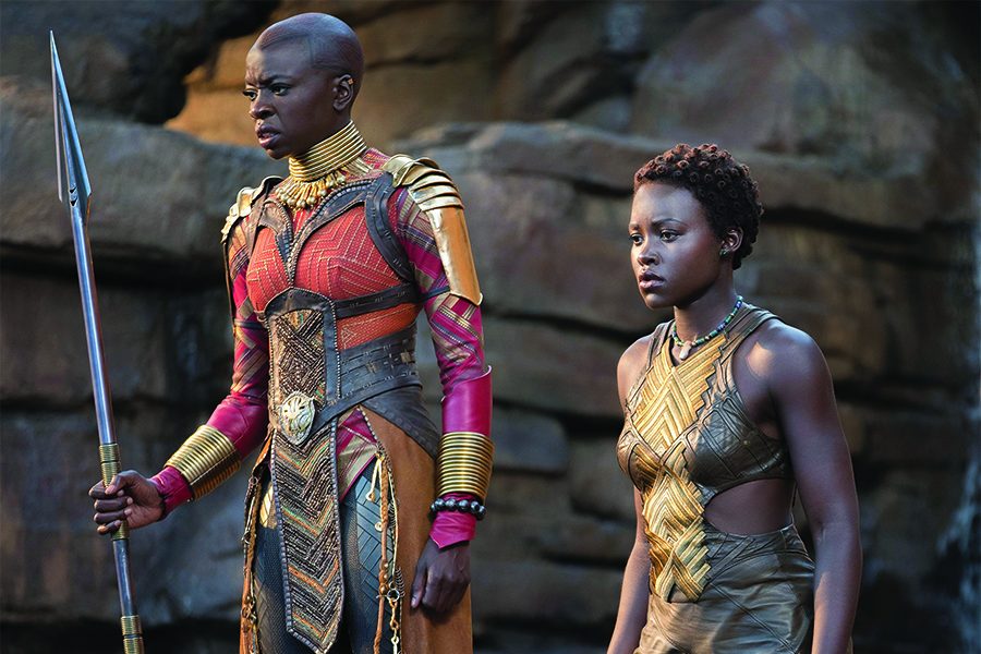 STANDING STRONG. Two of the strong female characters stand together before a fight scene. People have been drawn to “Black Panther” for its non-traditional portrayal of both  African-Americans and women. 