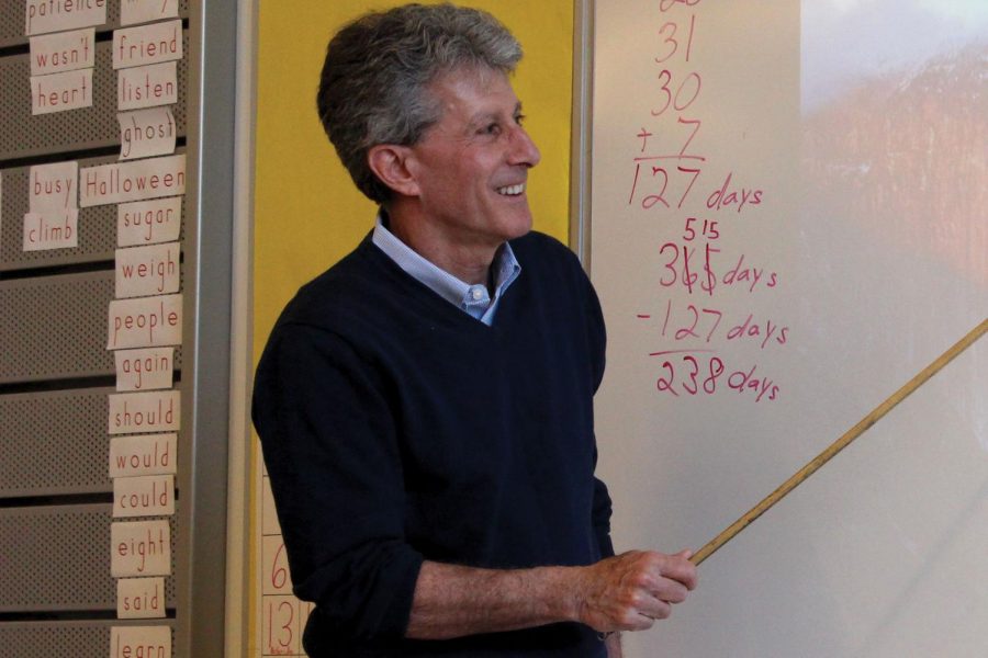 KEEPING TIME, TEACHING TIME. Spike Wilson teaches his second grade class units of time. He recently won an IADA honor.