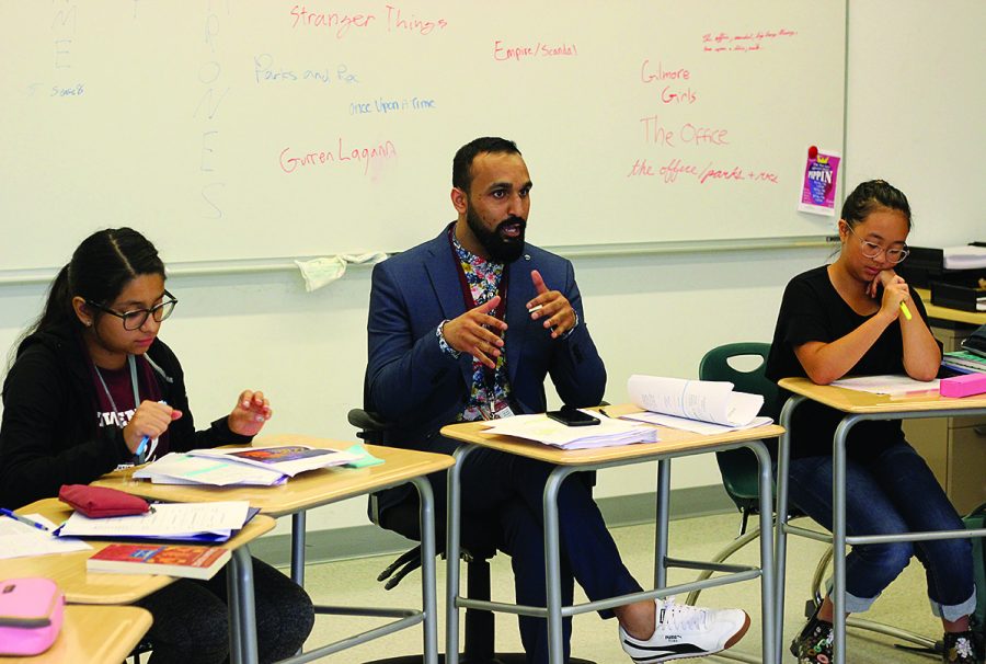 LITERARY LEARNING. New English teacher Hasham Bhatti speaks to a freshman class. This year’s new faculty members represent more people of color than in past years.