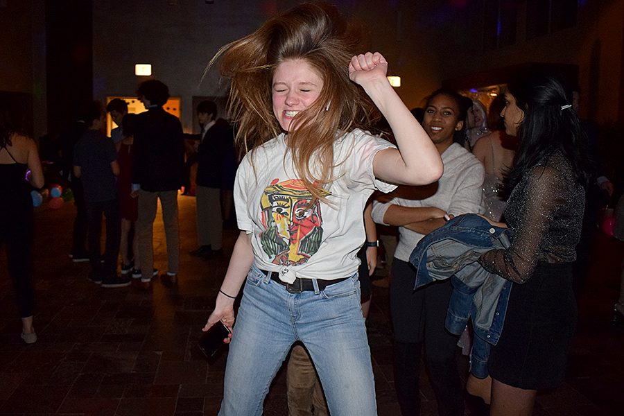 DANCE YOUR HEART OUT — Junior Eleanor Skish dances at the Winter Formal. Approximately 200 students attended.