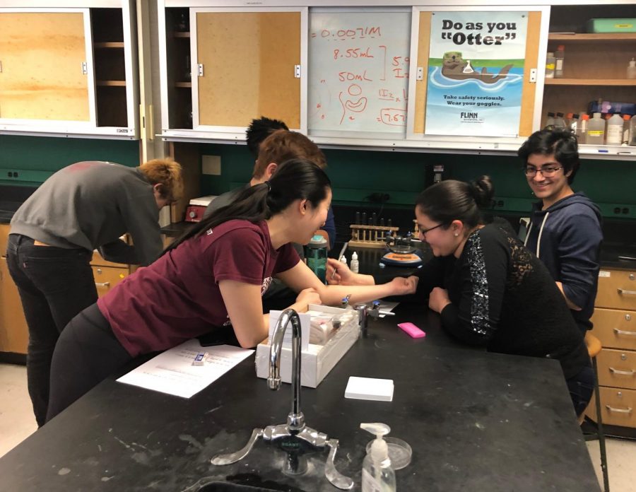Members of the U-High Science Team prepare for the next competition.