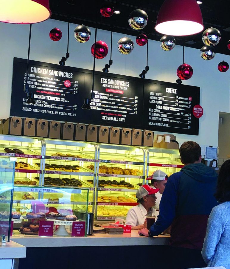 SUGARY SNACKS. Customers line up to get a fresh doughnut across the street from Wrigley Field. The shop offers a wide range of flavors, including Candied Maple Bacon, Pistachio-Meyer Lemon, and Valrhona Chocolate Cake.
