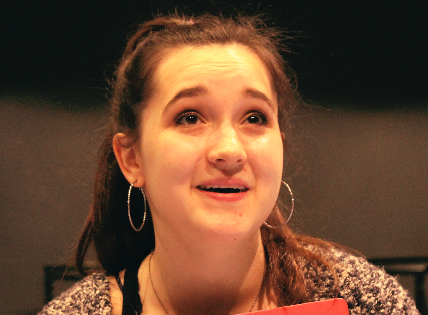 LIGHTS, CAMERA, PASSION. Anna Schloerb, a senior, rehearses her role as Sophie Sheridan in U-High’s staging of “Mamma Mia!” for the spring musical. Anna combines her other extracurriculars and long-time interests, such as singing and dancing, along with theater, all in this role.