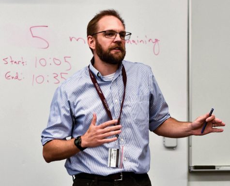 LIFE LESSONS. Standing in front of a white board, Humanities teacher Sam Nekrosius gives a demonstration to his seventh-period class. Combining English and History, The course encourages students to place their own identities in the context of American social justice. 