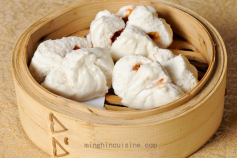 Barbecue pork buns sit in a steamer basket at MingHin Cuisine. The buns are a popular part of their expansive Dim Sum menu, which is designed for sharing.