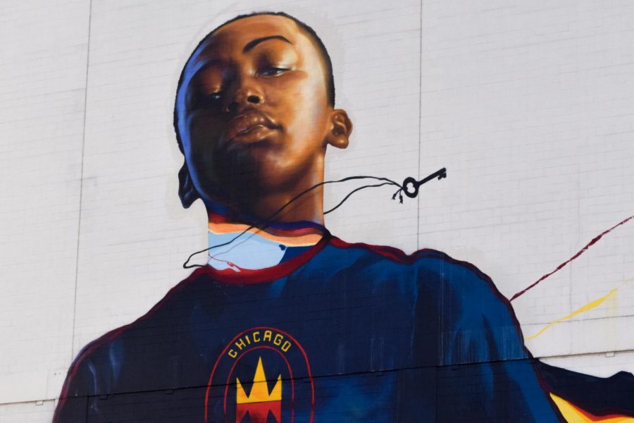 STAND FOR CHICAGO. An 80-foot tall mural looms over the British International School soccer field in the South Loop on the back of the Roosevelt Collection. The artist, Max Sansing, sought to “represent Chicago youth” with his artwork. According to the Fire, the mural will stay up for at least three years.