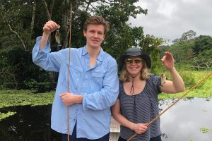 Senior Nick Beach and Sally Beach, mother, fish piranhas in Iquitos, Peru. “Instead of doing it and having fun, in the back of your mind you’re always thinking of what’s next, what are we gonna do?” Nick said regarding his four-day stay in the Peruvian Amazon.
