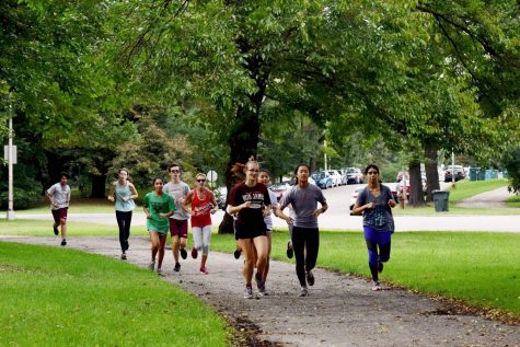 U-Highs cross country team runs across Midway Plaisance Park to practice in the fall 2019 season. Cross country is one of the sports that will continue to run practices this fall.