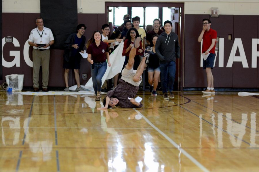Students flood into gymnasium at back to school event in 2019.
