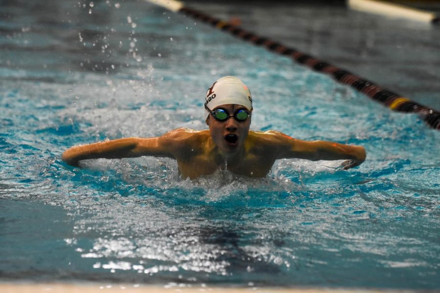 Junior+Spencer+McKula+strides+forward+across+his+lane+during+a+Dec.+12%2C+2019+meet+at+Latin.+Due+to+continual+postponement+of+winter+sports+this+season%2C+boys+swimming+has+been+one+of+many+teams+held+on+standby+until+further+notice.