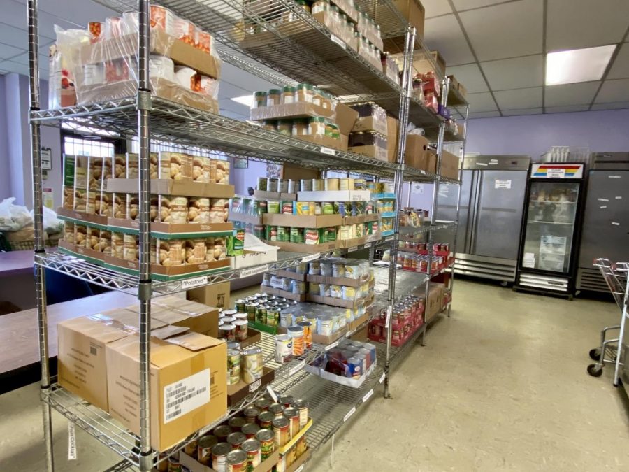 Stacks of food line the shelves of Vital Bridges food pantry located in the Englewood neighborhood. 