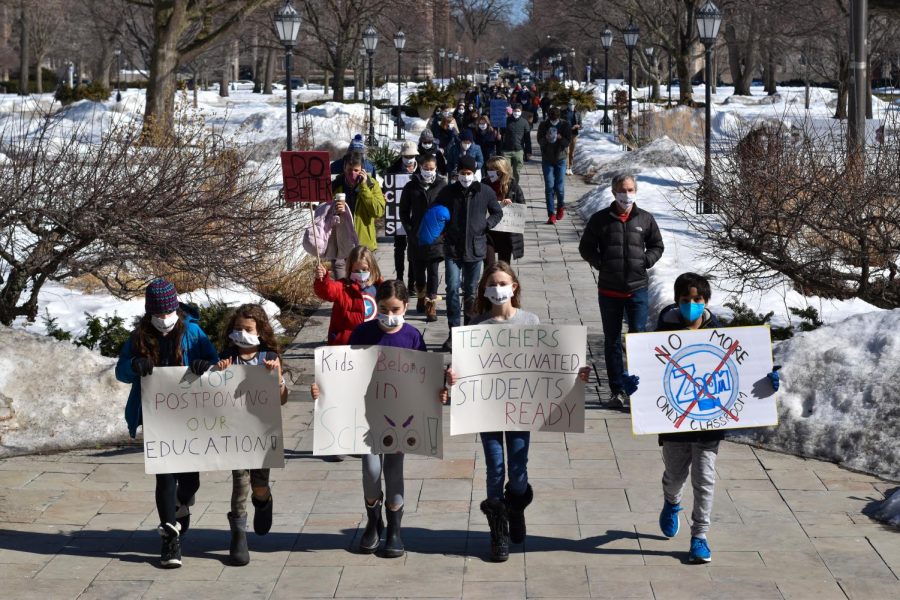 Students and parents protest Labs conservative return-to-school approach and lack of transparency on Feb. 25 after gathering in front of Blaine Hall.  