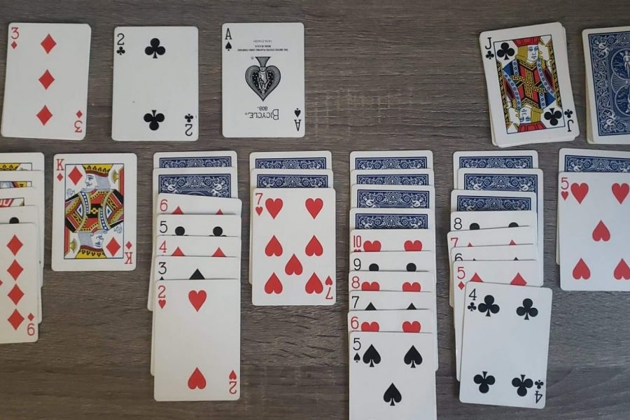 With seven bottom rows and a pile to sort through, solitaire players must organize the deck from ace to king within the rules of the game. Solitaire has become a way for students to pass the time and connect with friends and family.