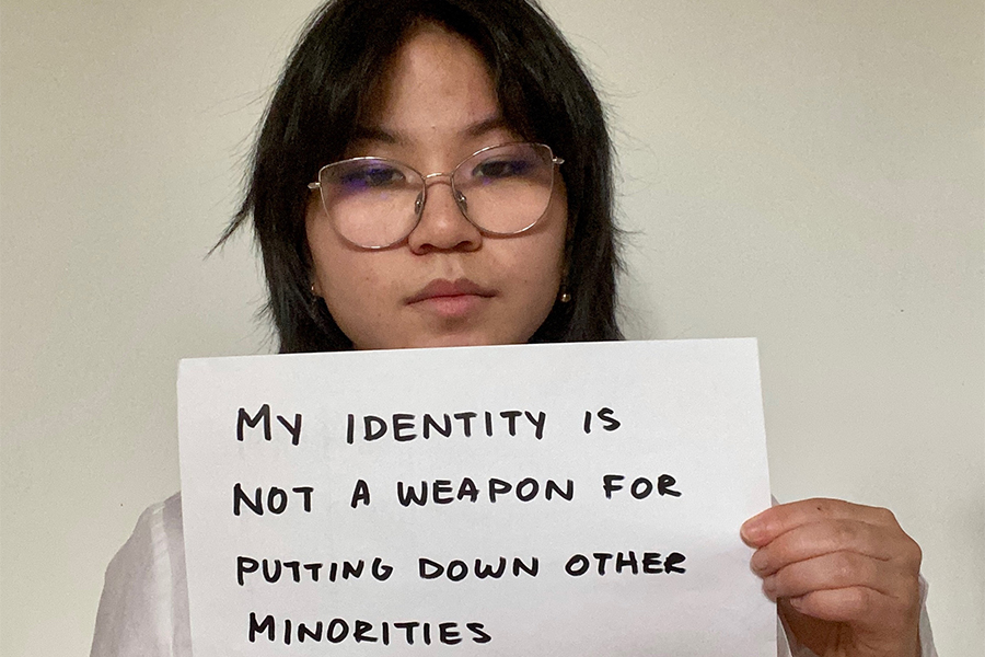  To celebrate Asian American and Pacific Islander Heritage Month and to fight stereotypes, sophomore Jade Deng holds a white poster sign about why she is not the model minority. Jade is the only student who submitted a photo, but students have until May 17 to email their photos to ASA president Zara Baig or adviser Aria Choi.