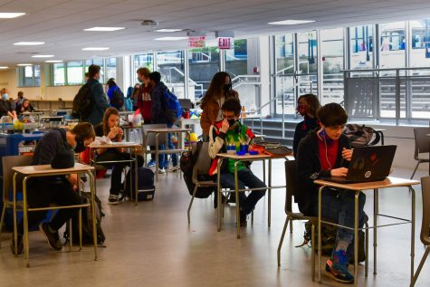 No longer filled with large tables designed for student gathering, the school cafeteria looks very different this year. Students report that these physical changes have impacted the social dynamic previously associated with the space. 