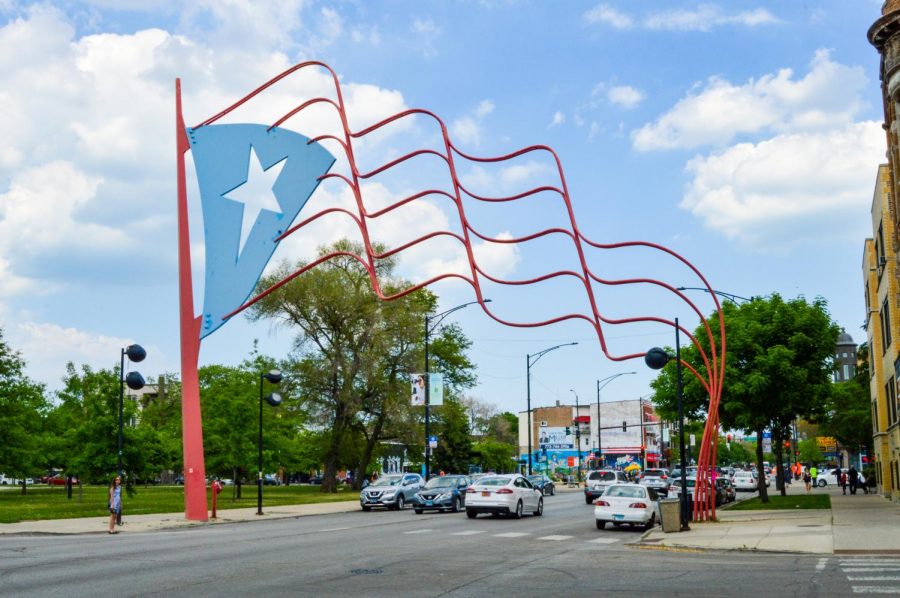 Steel Puerto Rican flags stand at each end of a portion of Division street called Paseo Boricua, which translates to Puerto Rican promenade.