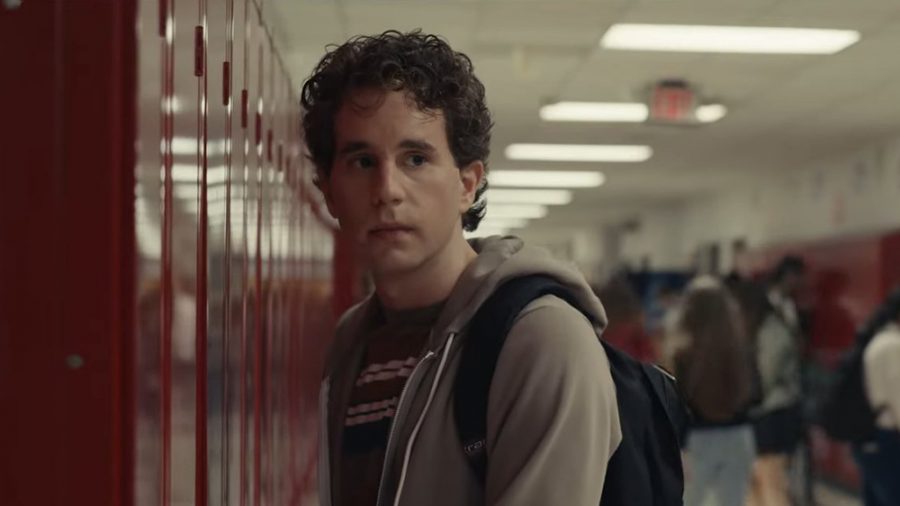 Anxiety-ridden student Evan Hansen stares off into the distance in his high schools hallway.
