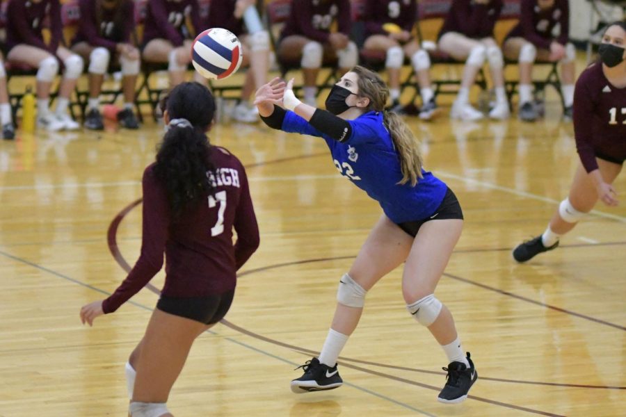 Sophomore Chloe Hurst sets the ball in a game against The British School on Sept. 28. 