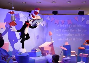  An animated “Cat in the Hat” speaks to an audience at the Dr. Seuss experience at Water Tower Place. 