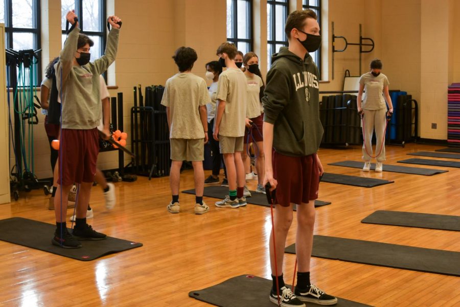 Students complete a workout during P.E. class. P.E. units switched to four-week increments where students stay in the same class with the same teacher the whole year.