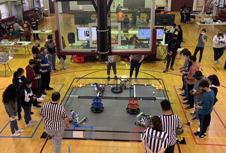 Members of robotics team Sprockets & Screws compete in an alliance with another team during the Chicago First Tech Challenge Competition on Nov. 13.