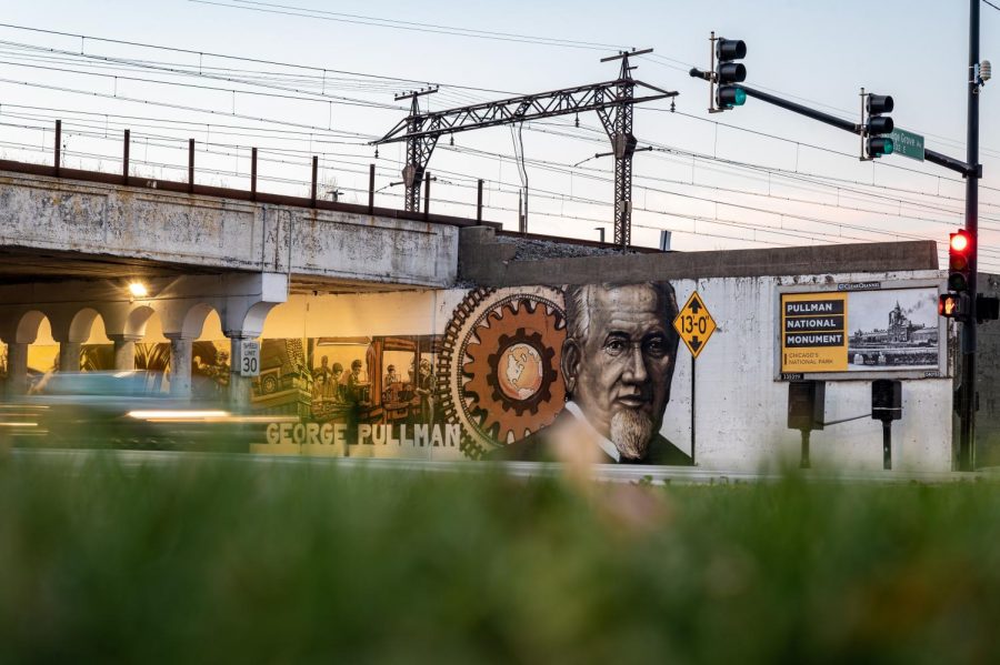 A mural of George Pullman watches passersby below the 111th Street Metra Station that was once used by the Illinois Central.