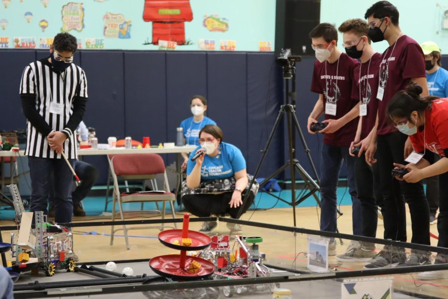 Members of the Sprockets & Screws robotics team control a robot during the Chicago regional Feb. 19.