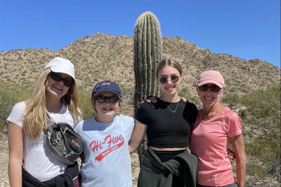 Senior Gracie Norton and freshman Millie Norton pose with their family on a spring break trip to Arizona.
