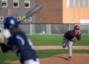  In a game against Jones College Prep on April 26, junior Sohrab Rezaei throws a pitch on University of Chicago’s J. Kyle Anderson Field.
