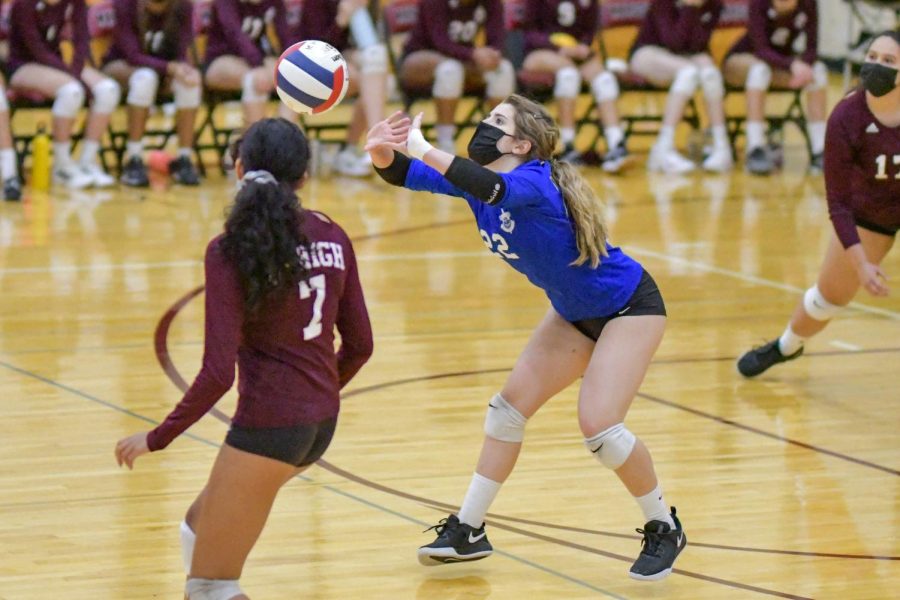 Sophomore Chloe Hurst sets the ball in a game against The British School on Sept. 28. The Maroons won 2-0. 

