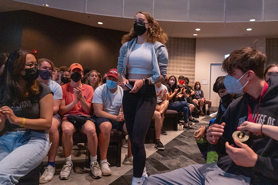 Senior Amanda ODonell walks down Gordon Parks Arts Hall Assembly Hall to receive her award as students enthusiastically applaud. She was a William “Doc” Monilaw Medalist. 