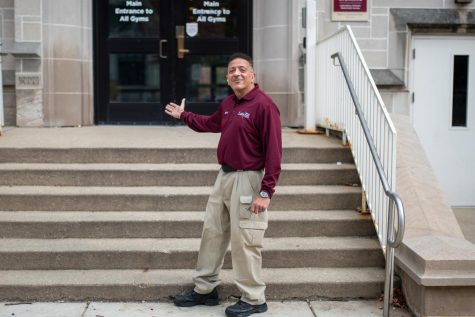 Community service officer Brian Arceneaux stands in front of the Kovler Gym building where he works. Throughout the day he is busy assisting and greeting students and teachers. Mr. Arceneaux was awarded the 2022 Billy Streeter Award for Service Excellence.