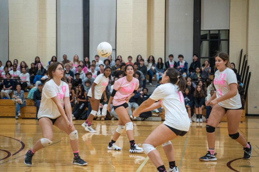 Junior+Micayla+Hatcher+steps+up+to+the+ball+during+the+Dig+Pink+game+on+Oct.+14+against+the+Latin+School+of+Chicago.+The+team+raised+over+%242500+for+research+and+treatment+for+stage+4+breast+cancer.
