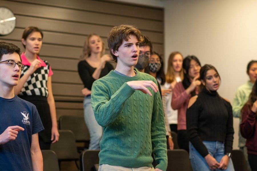 Junior Max Mathias practices in Bel Canto on Nov. 15. Since he took choir in sixth grade, Max has found joy in singing and has worked to spread that joy to others. 