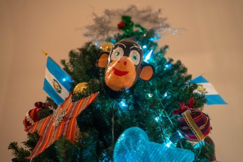 A monkey is displayed on the El Salvador tree at the MSI Christmas Around The World Exhibit. The trees are made by community volunteers to represent the characteristics of the countries. 