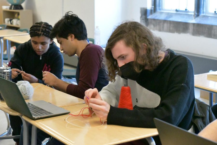 In Threads and Fabrics, senior Daniel O’Connor learns to knit. The workshop, held in C404, featured many activities including sewing, mending and upcycling. 
