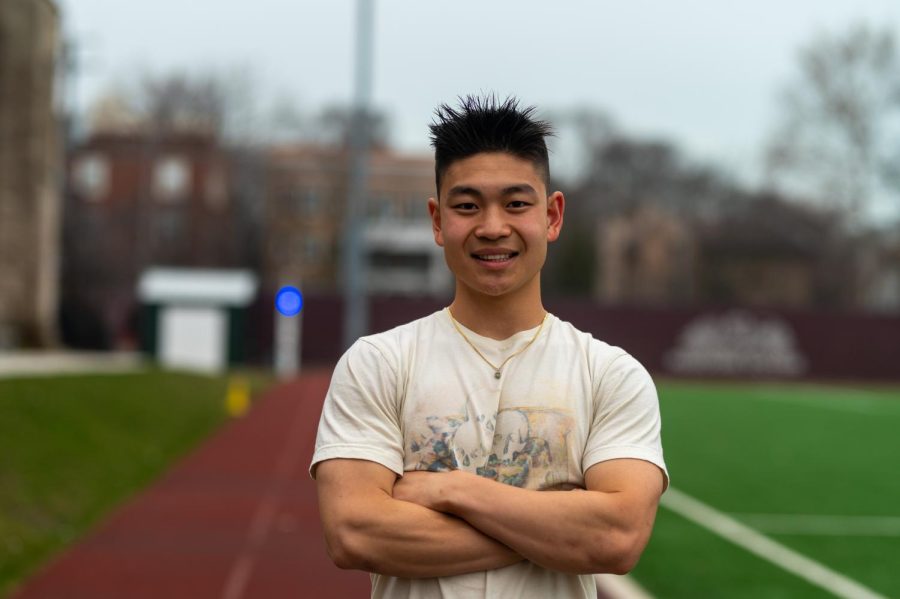 Junior Carter Chang, organizer of the mock meet, stands on the U-High outdoor track. 