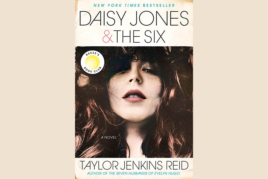%E2%80%9CDaisy+Jones+%26+the+Six%E2%80%9D+is+a+historical+fiction+novel+about+rock+n%E2%80%99+roll+in+the+70s+by+author+Taylor+Jenkins+Reid.