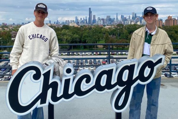 Paul Alber (left), German exchange student, and senior Ellis Domenick (right) went to a White Sox game with other exchange students.