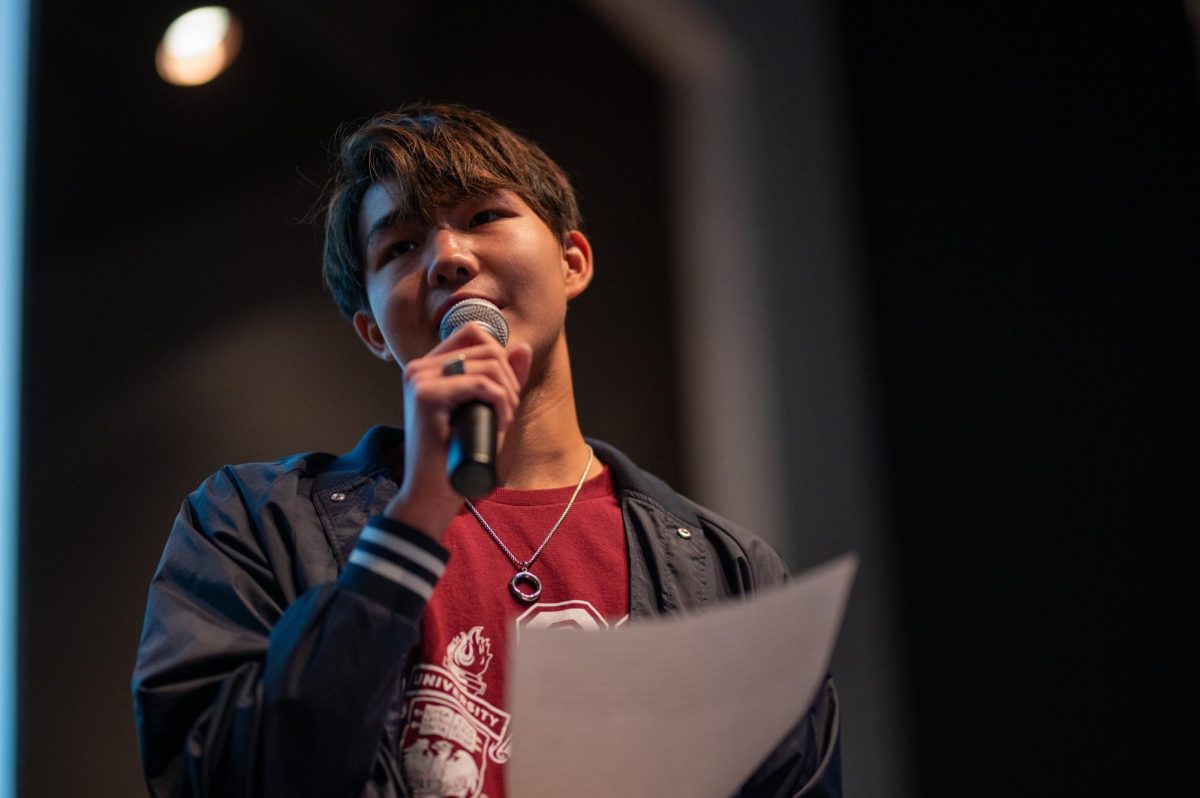 Aiden Yu, the newly elected ninth grade class president, addresses his classmates during his election speech on Sept. 28 in Griffin Auditorium.