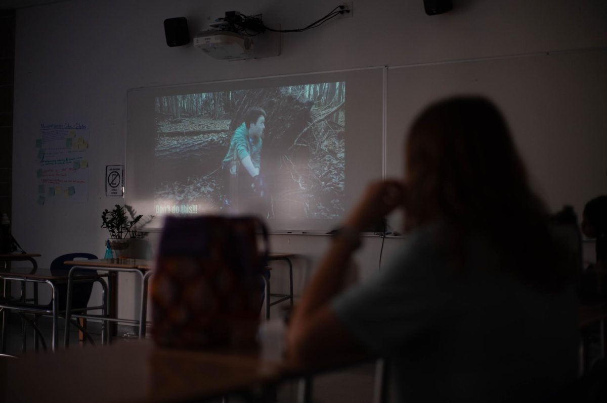 A student watches an informational video about the basics of filmmaking. The U-High Film Society, meeting every Wednesday during lunch in C211, will be training students to develop their own projects.