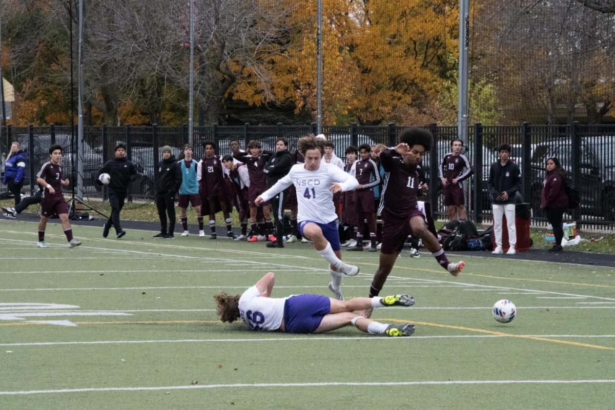 Alula Teklu runs toward the ball at super-sectionals on Oct. 28. Despite a rough start to their season, the boys soccer team made a comeback, becoming the second team in U-High soccer history to win sectionals. Their season ended in a 2-1 loss at super-sectionals. 