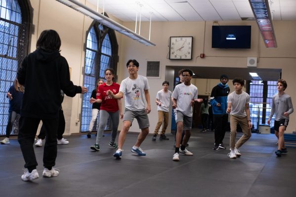 The fencing team works on technique and stance during a January practice. The team ended its season with a first-place medal won by the boys épée team in the final Great Lakes Conference Team Championships on Feb. 3.
