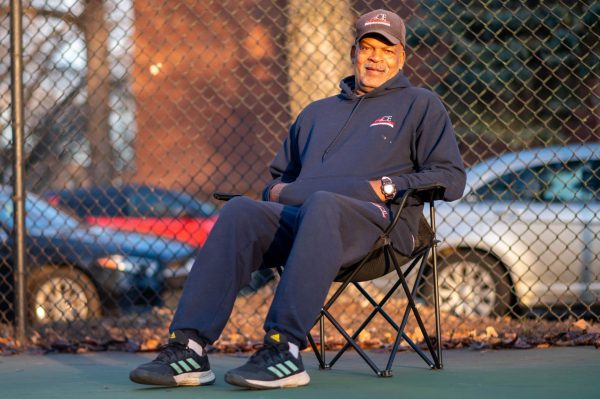 CONNECTING THE COMMUNITY. Local tennis coach Tyron Mason interacts with the Kenwood community as he coaches. He builds relationships with his students along with the neighborhood, becoming a well-known figure in the area.