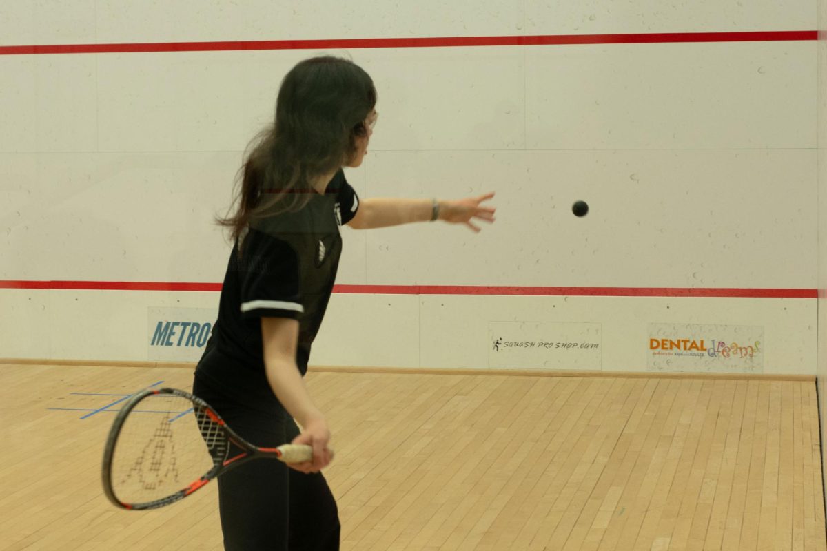 During+a+practice+session%2C+senior+Hannah+Dinner+prepares+to+swing+her+racket.+On+Feb.+11%2C+the+squash+teams+season+ended%2C+with+several+individual+game+wins+having+gone+to+its+players+but+no+victories+in+overall+matches+for+the+team.%C2%A0