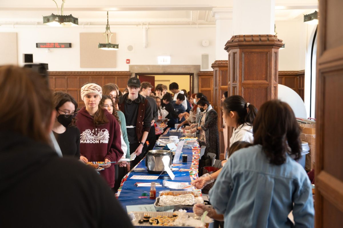 For the hour-long ArtsFest lunch period on Feb. 28, the Student Council hosted U-High’s first International Day, where a group of nearly 30 parent and staff volunteers provided students with a free lunch of international cuisine samples. 