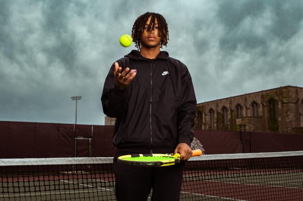 Working both on the court and in the classroom, Dash finds a balance between his academics and tennis.