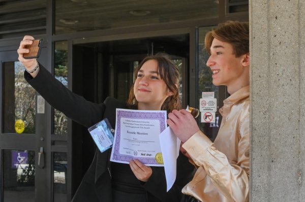 Sophomore Maggie Yagan takes a selfie with sophomore Ishie Holz after winning individual and team honors at the Northwestern MUN conference in Evanston April 11-14.